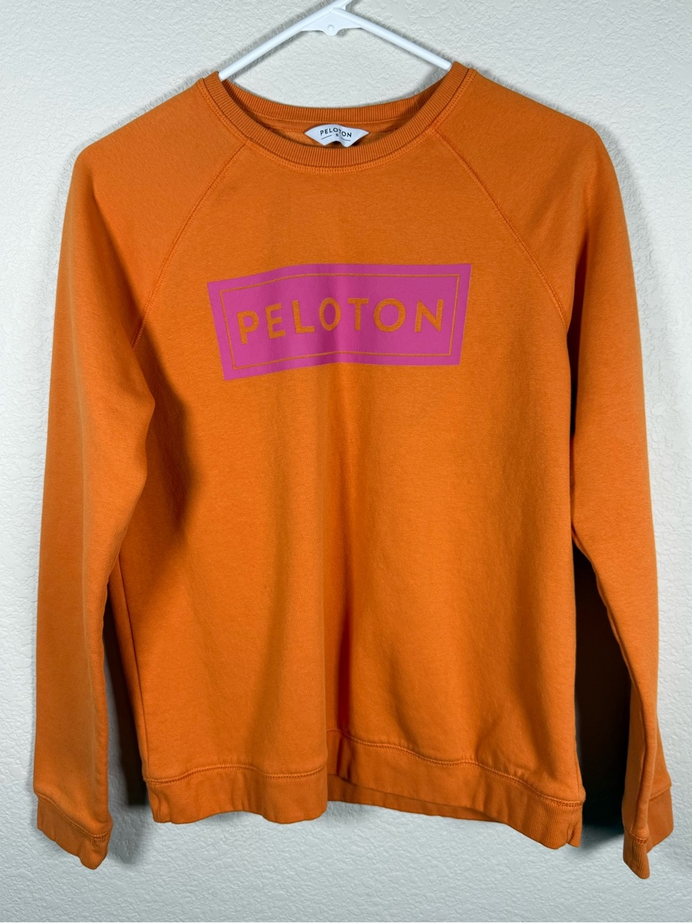 Peloton Orange Crewneck with Pink Logo